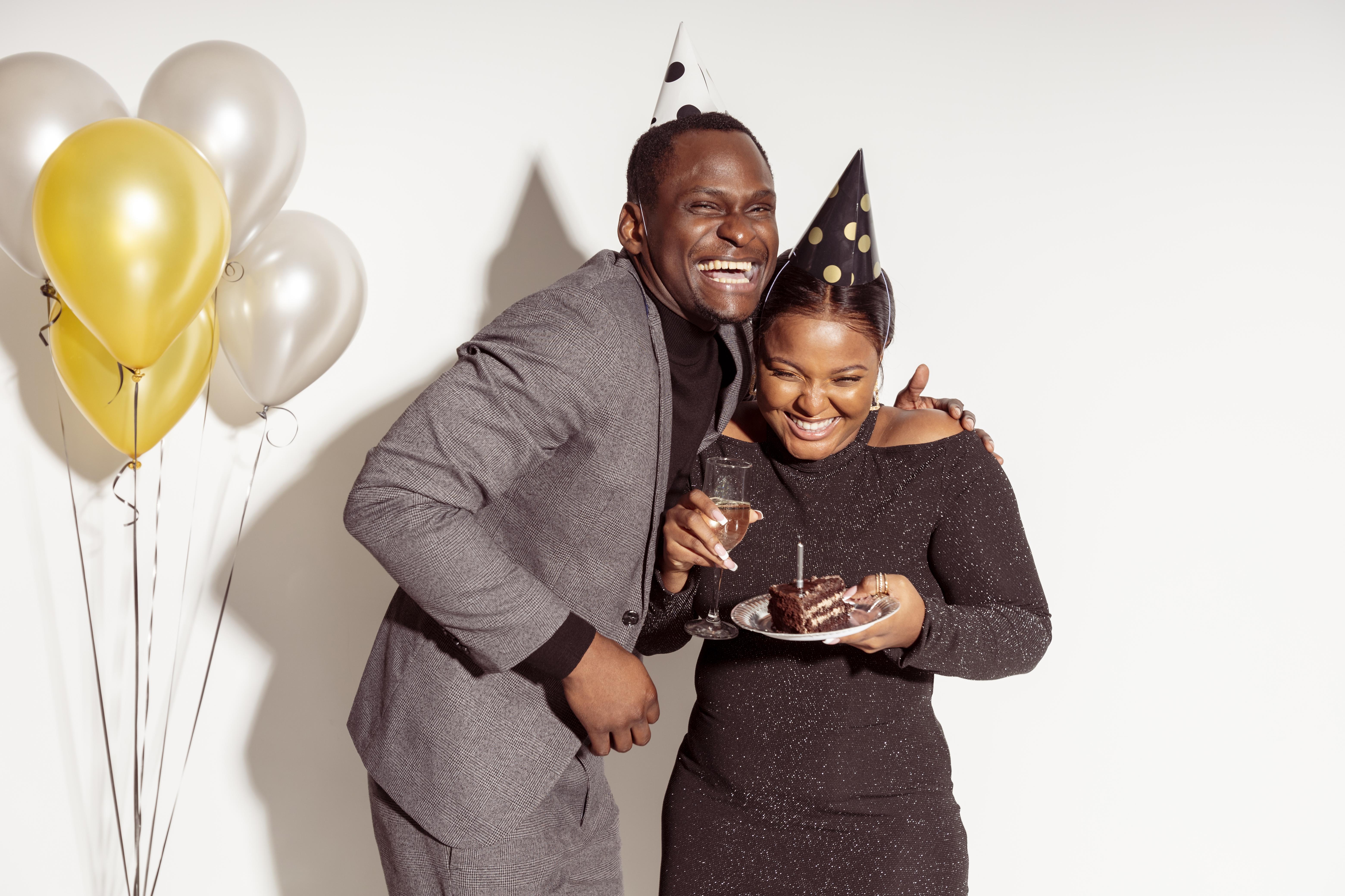 friends-holding-cake-laugh-happy-birthday-party.jpg